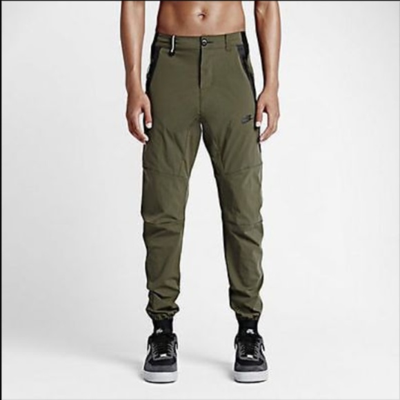 green nike tech pants